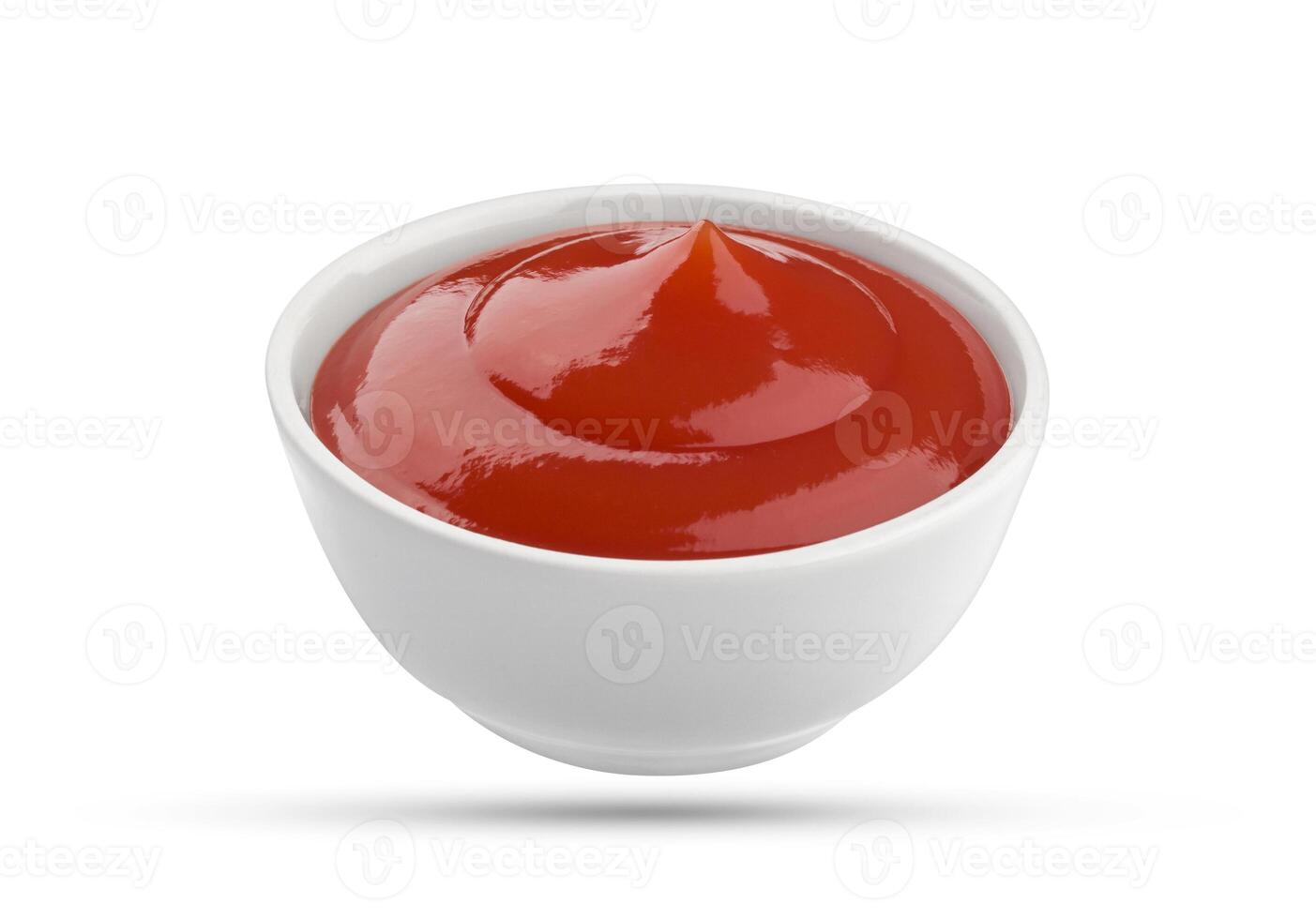 Ketchup bowl isolated on white background photo