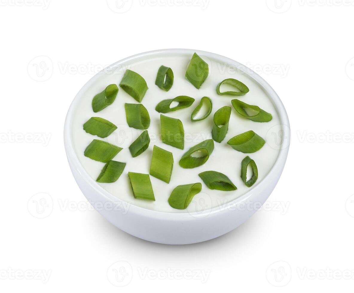 Sour cream and green onion isolated on white background photo