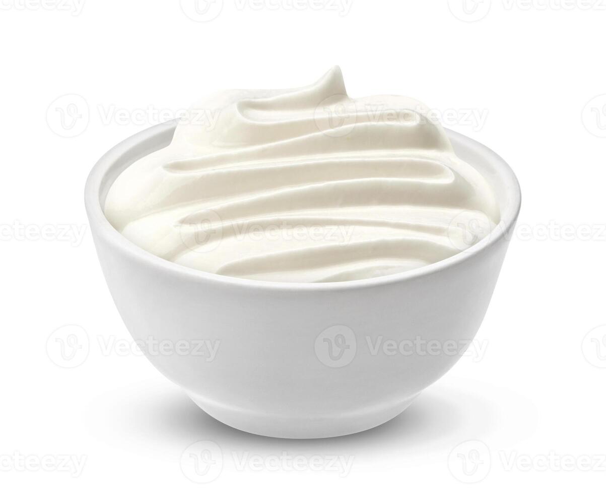 Sour cream in bowl isolated on white background photo