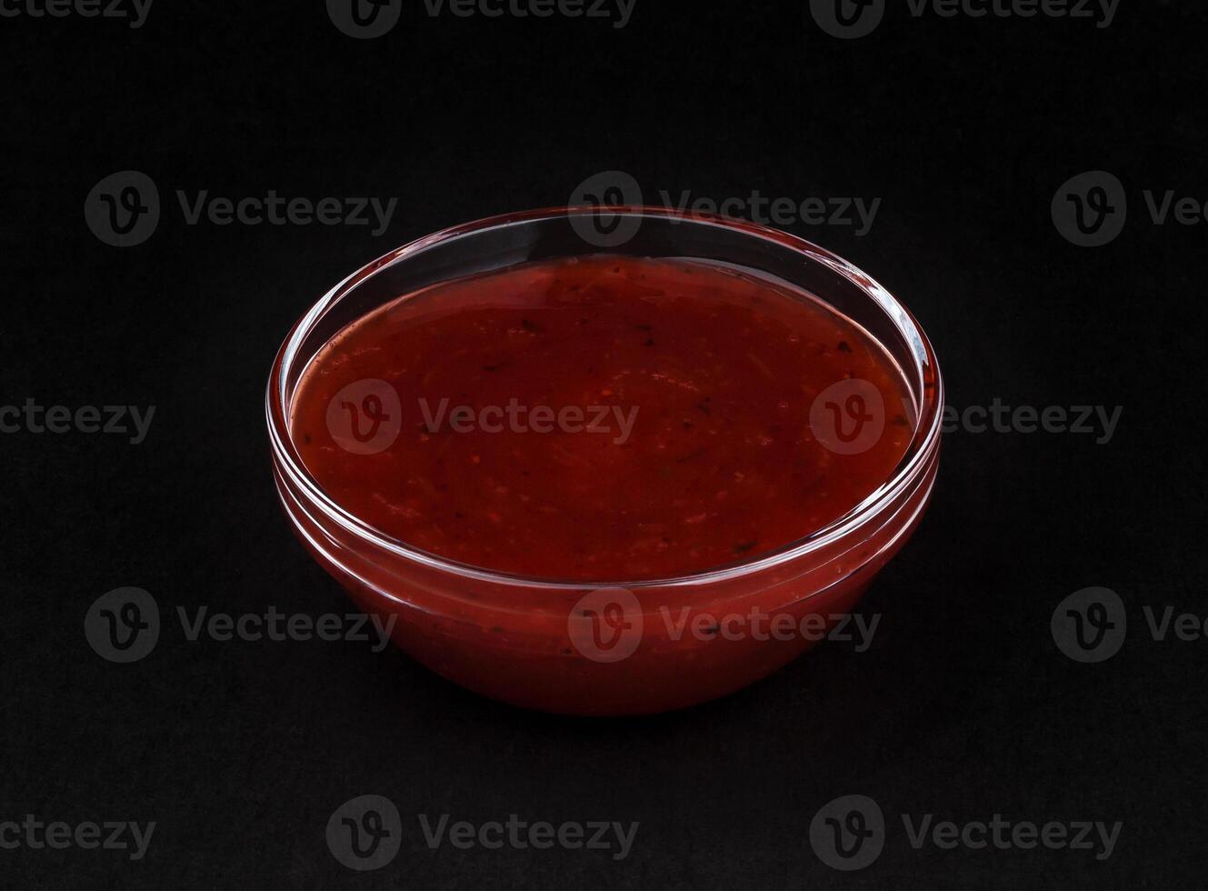 Cranberry sauce isolated on black background photo