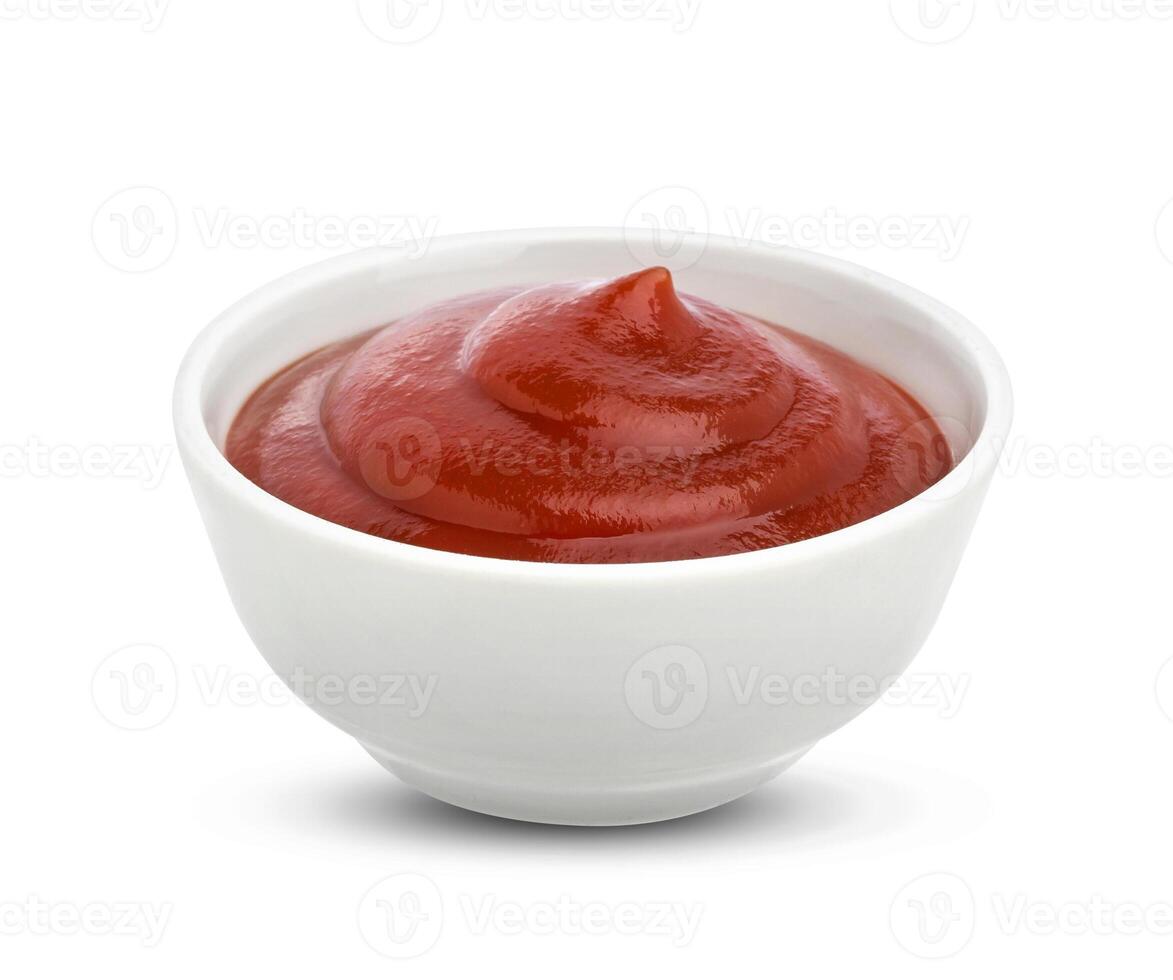 Ketchup in bowl isolated on white background. Portion of tomato sauce. With clipping path. One of the collection of various sauces photo