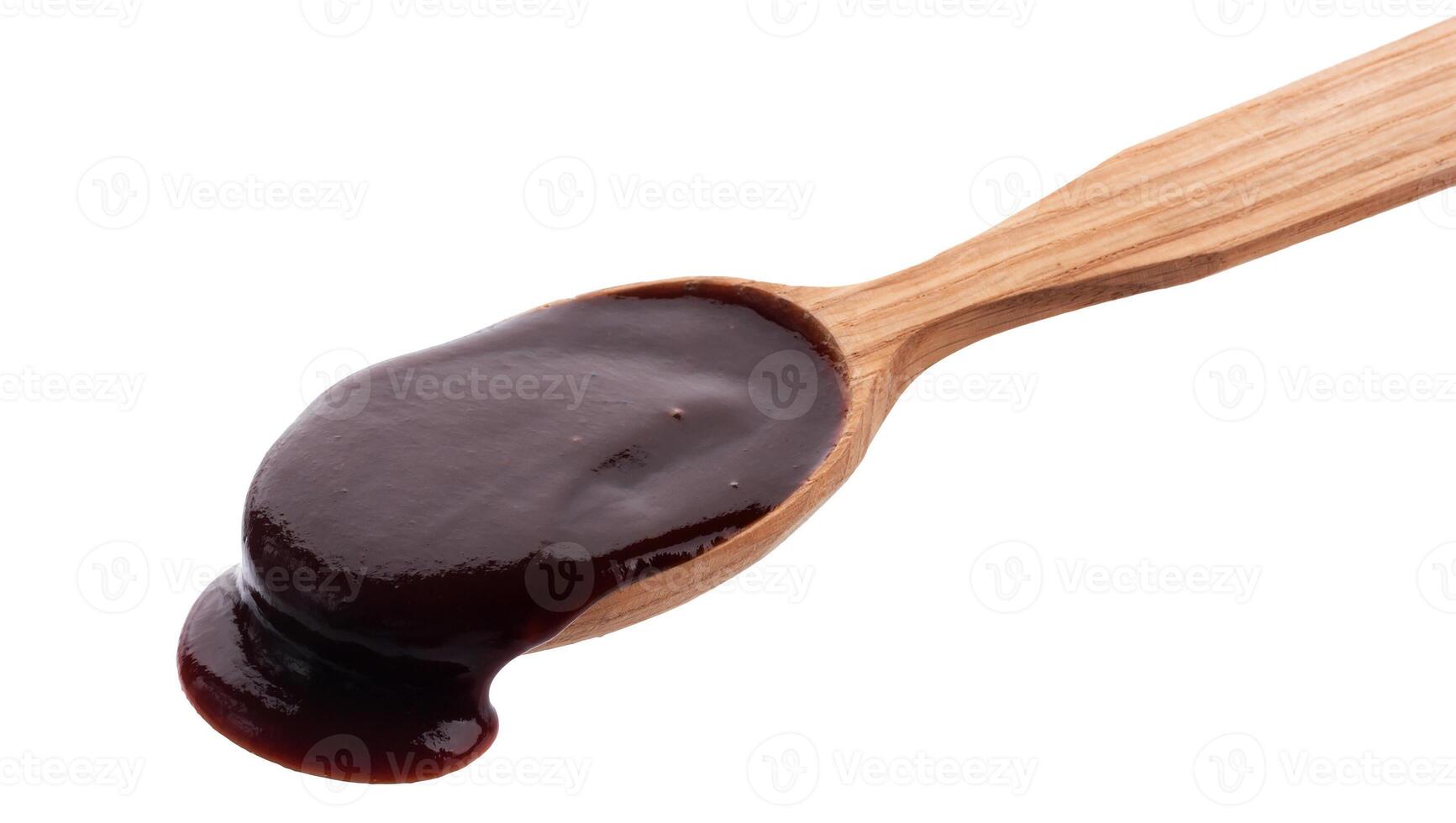 Barbecue sauce with wooden spoon isolated on white background photo