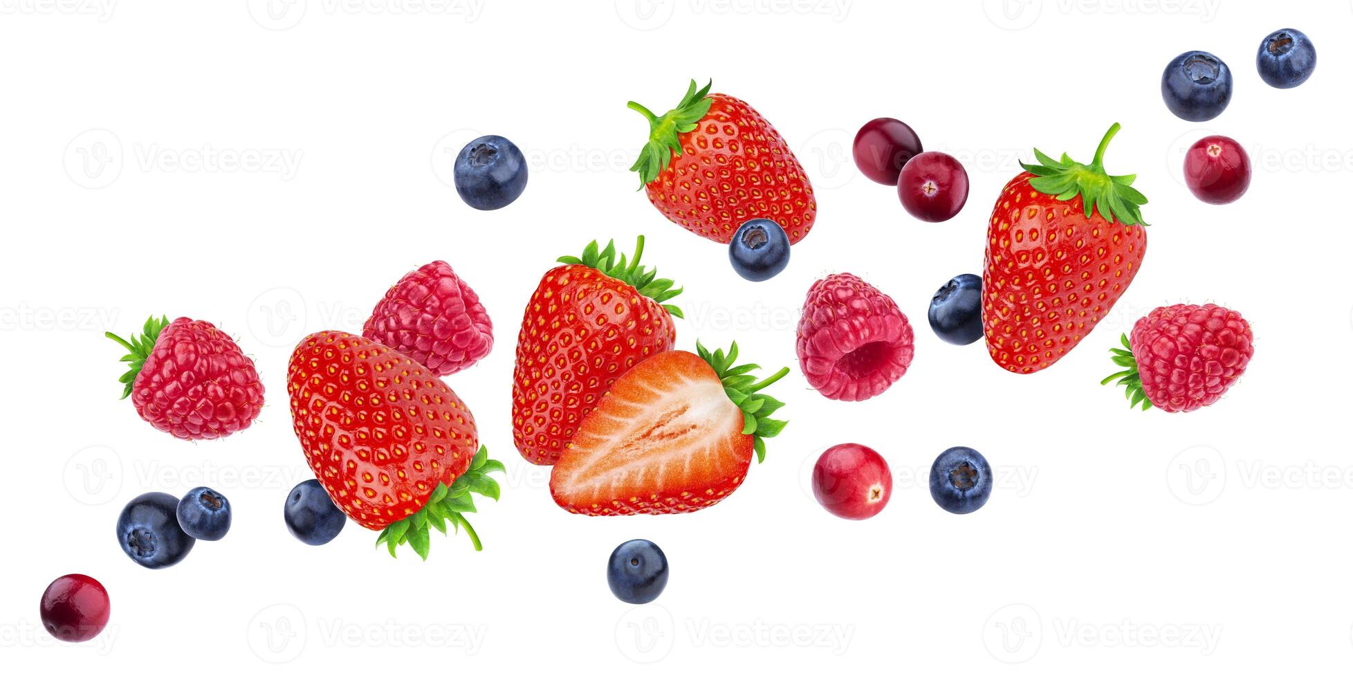 Flying berries isolated on white background with clipping path photo