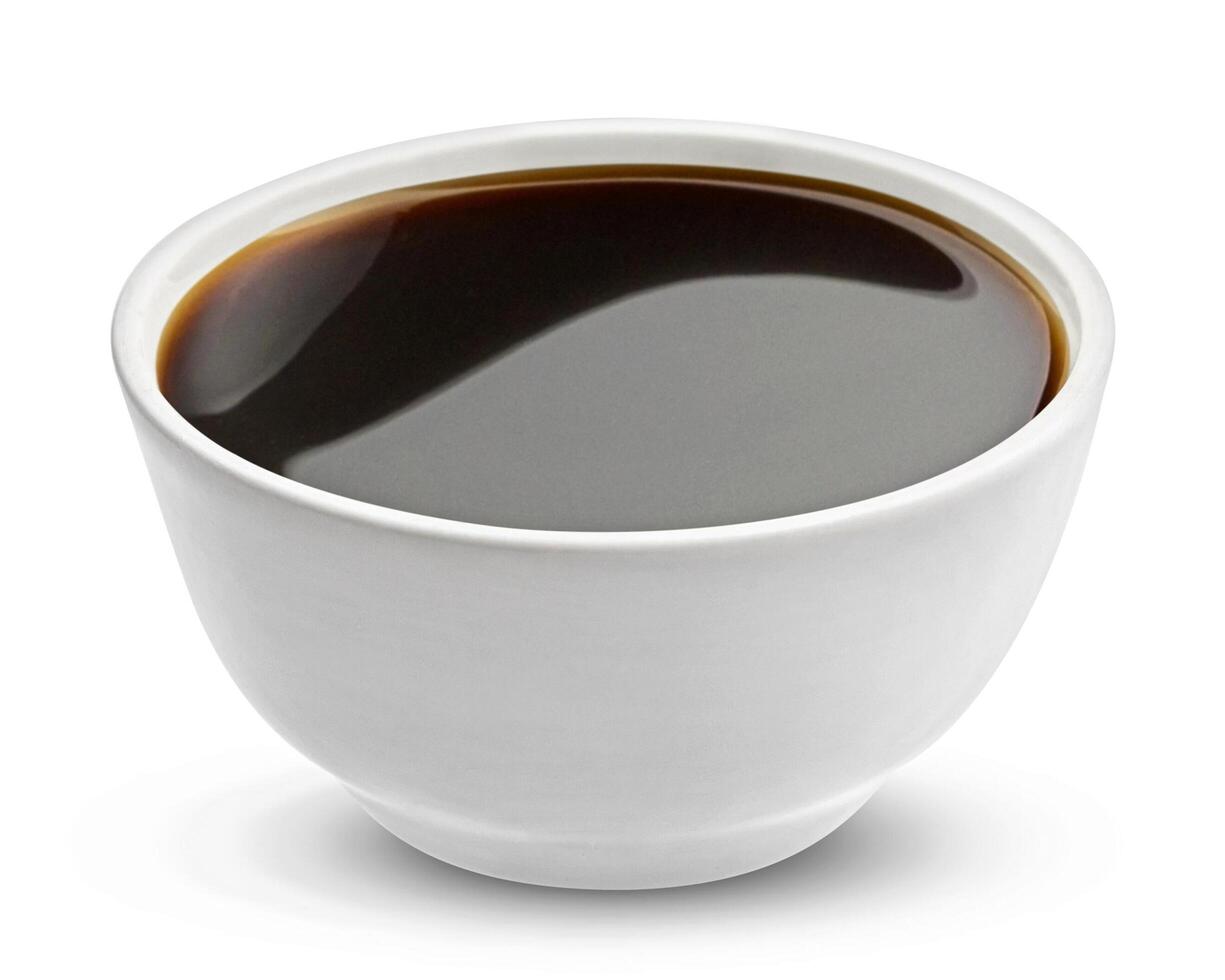 Soy sauce in bowl isolated on white background photo