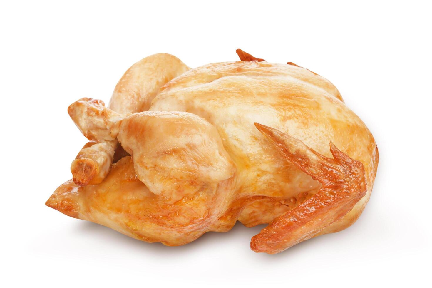 Roasted chicken isolated on white background photo