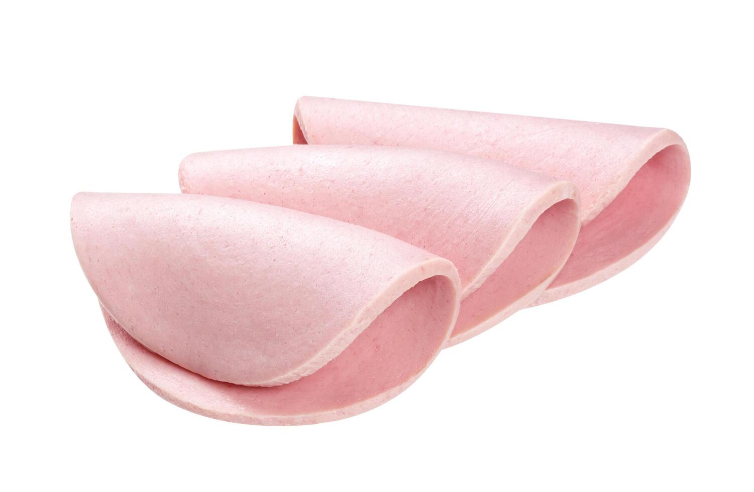 Boiled sausage ham slices on white background photo
