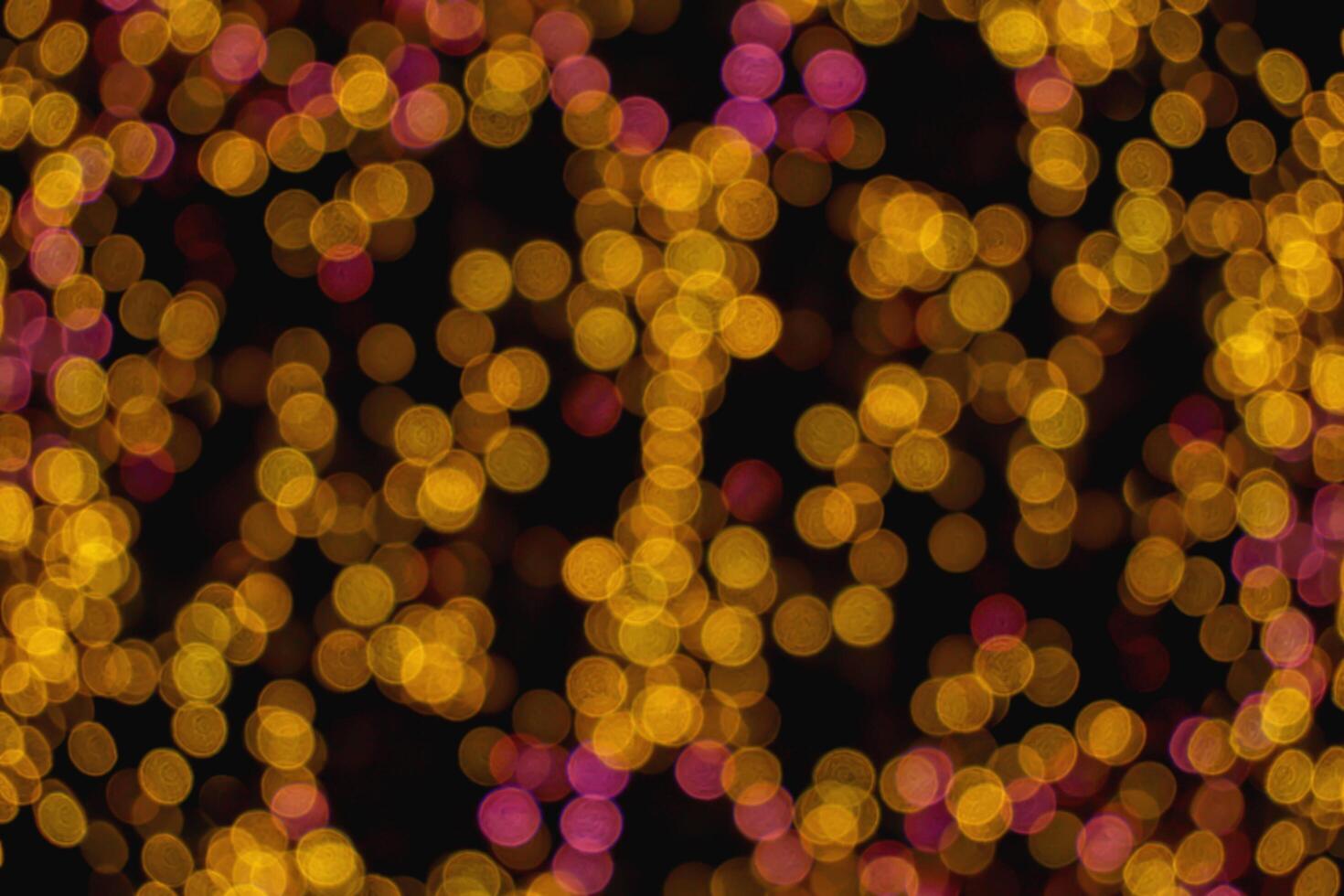 Small abstract blurred and bokeh of reflection lighting of led light bubs on black background. photo