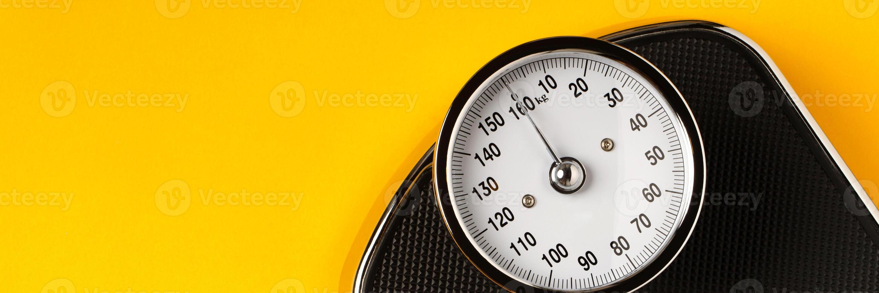 weighing scale and weight control for obese people photo