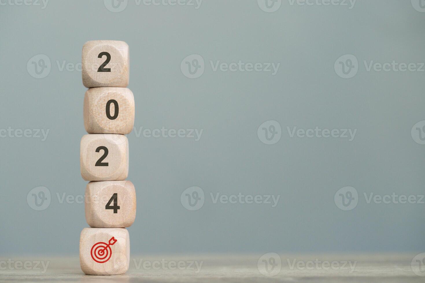 wood cube block with return on investment in stocks, crypto coins in 2024, growing according to target photo