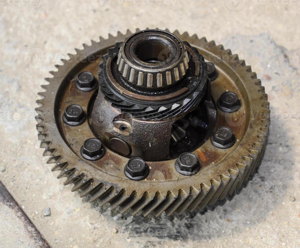 Dismantled box car transmissions. Gear with bearings. The gears on the shaft of a mechanical transmission. photo