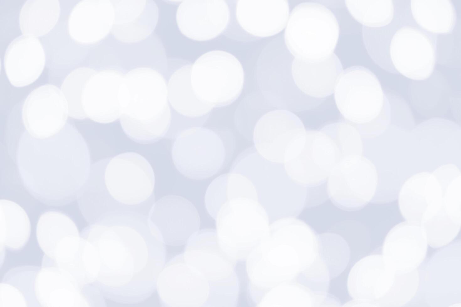 Beautiful sparkle silver and white abstract bokeh background. photo