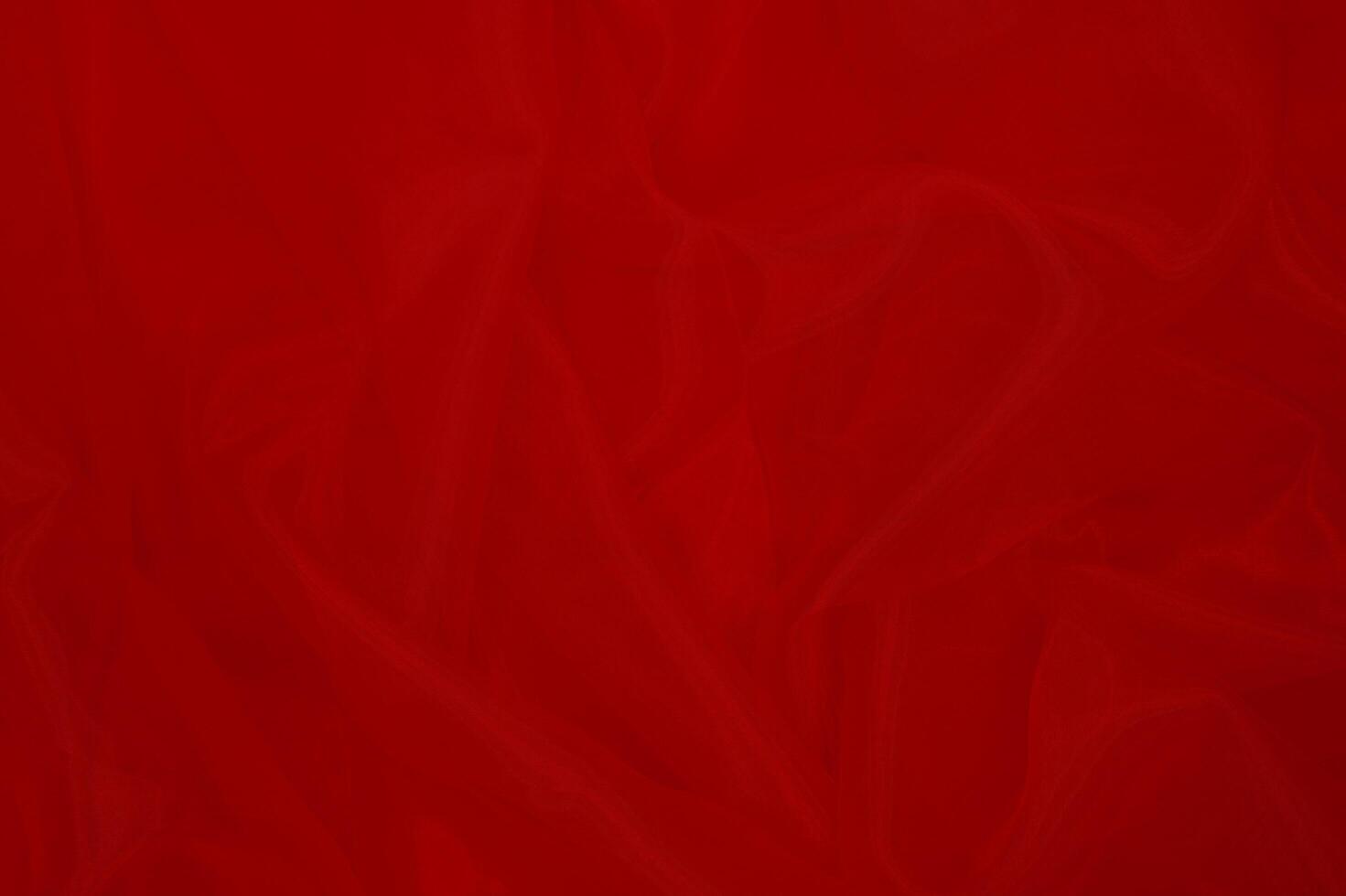 Red fabric texture background with copy space. photo