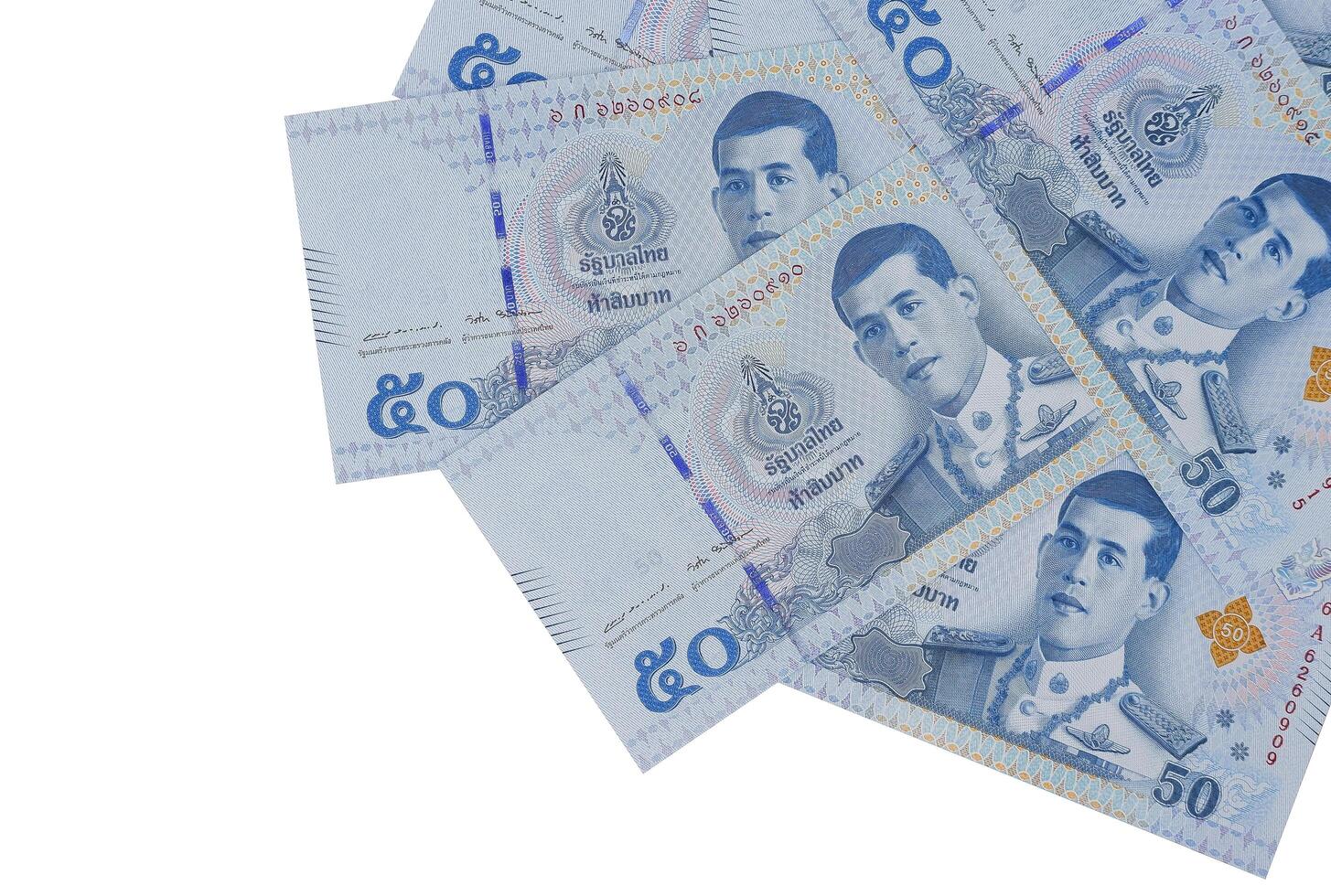 Pile of new 50 Thai Baht banknotes. Business and finance concept. photo