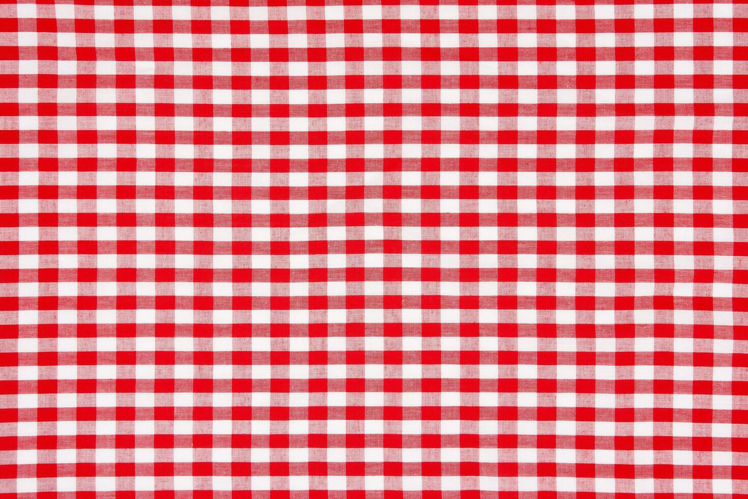 Red gingham fabric pattern background. photo