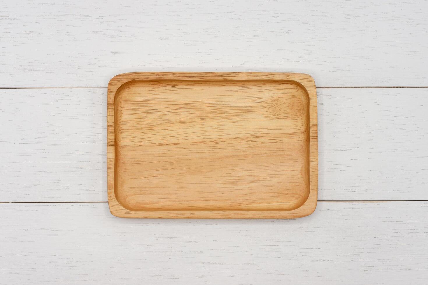 Empty rectangle wooden plate. Top view image. photo