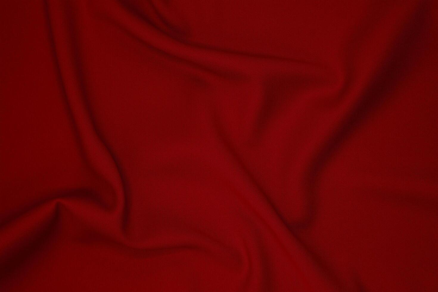 Red fabric texture background with copy space. photo
