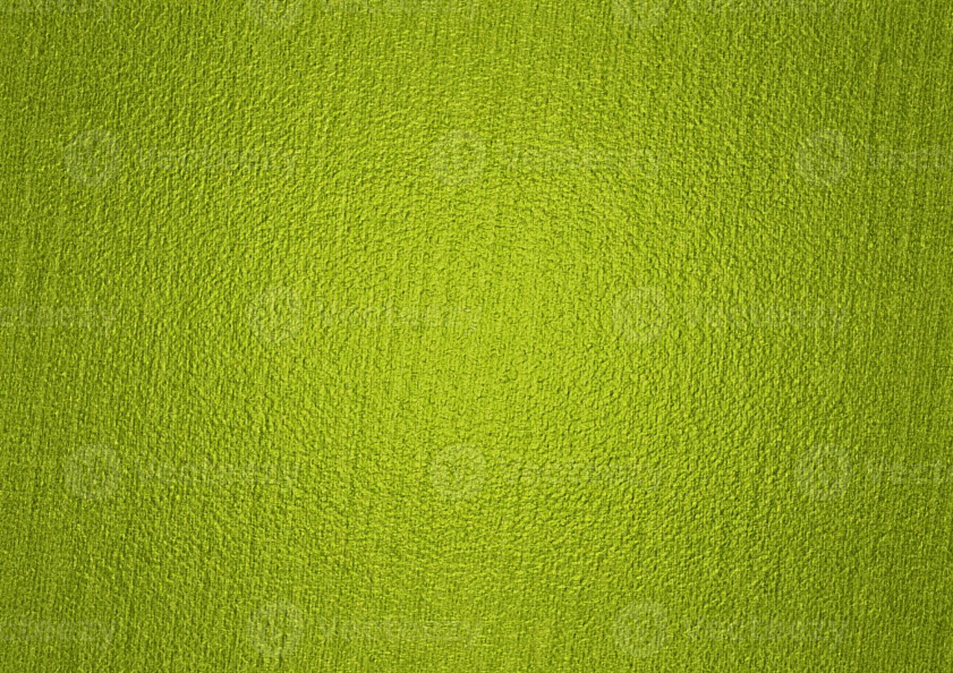 Green uneven texture background of foil, paper, canvas, wall, brush, or paint. Realistic green abstract background. Artistic green abstract background. Available for advertising. A4 paper size. photo