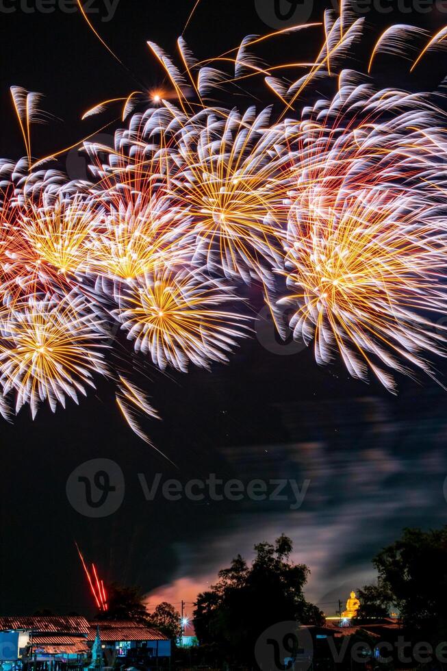 fireworks on the river in the dark sky photo