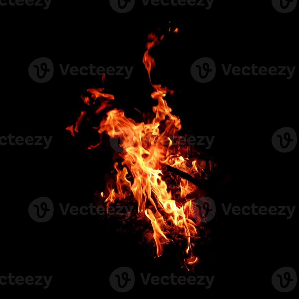 Fire of flame burning isolated on dark background for graphic design purpose photo