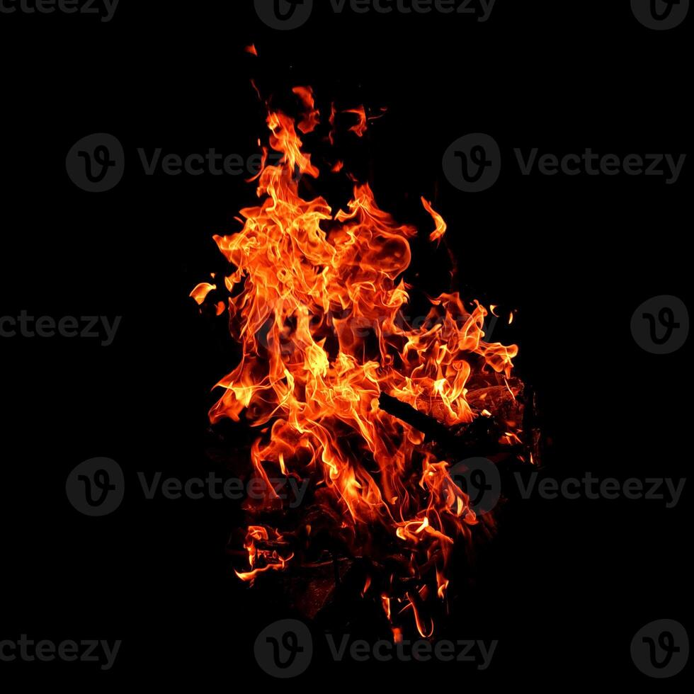 Fire of flame burning isolated on dark background for graphic design purpose photo