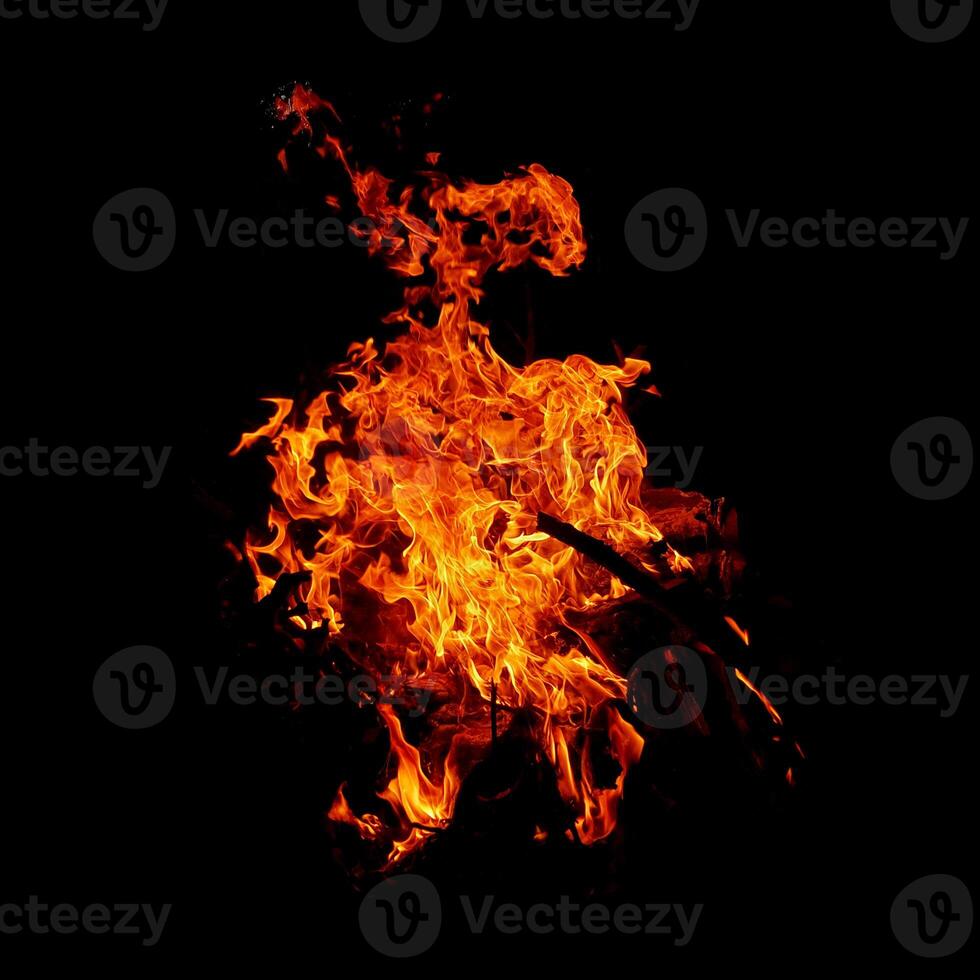 Fire of flame burning isolated on dark background for graphic design purpose photo