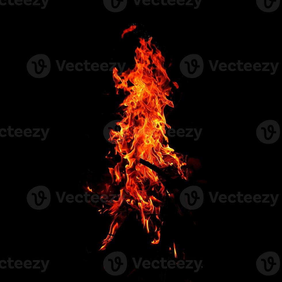 Fire of flame burning isolated on dark background for graphic design purpose photo
