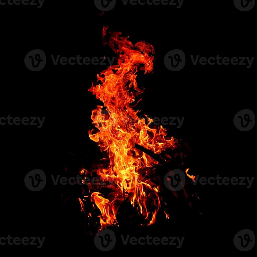 Fire of flame burning isolated on dark background for graphic design purpose photo