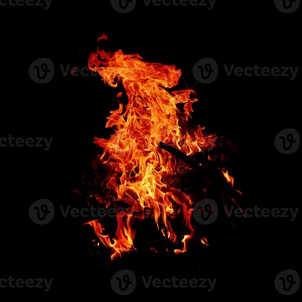 Fire of flame burning isolated on dark background for graphic design purpose photo