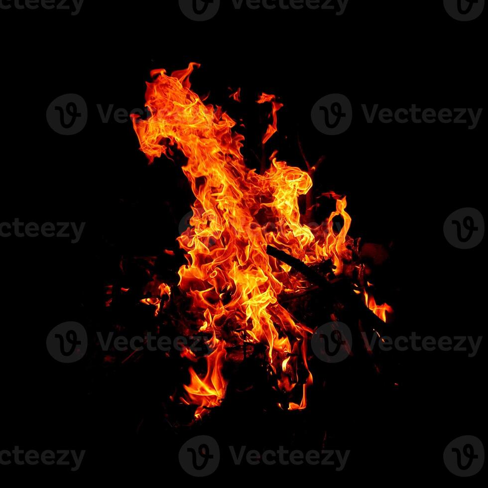 Fire of flame burning isolated on dark background for graphic design purpose photo