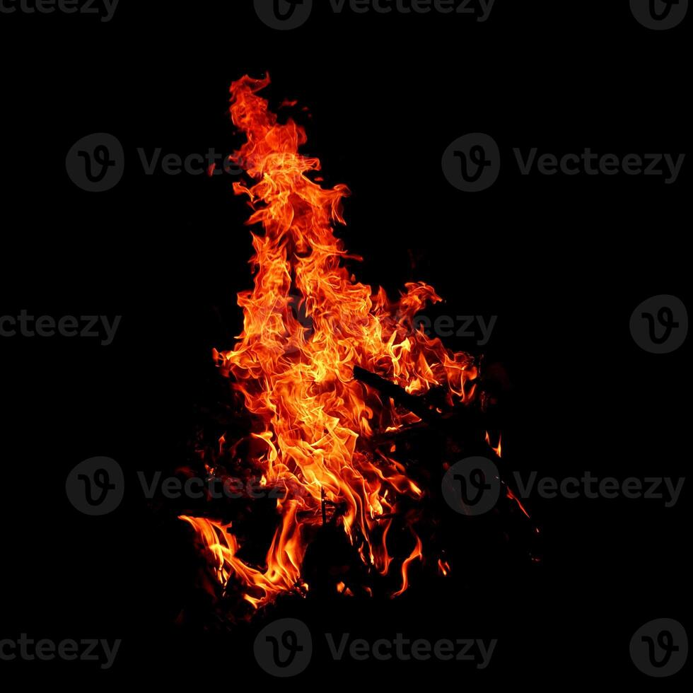 Fire of flame burning isolated on dark background for graphic design purpose photo