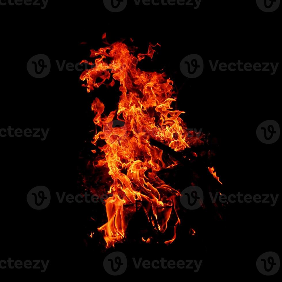 Fire of flame burning isolated on dark background for graphic design purpose photo