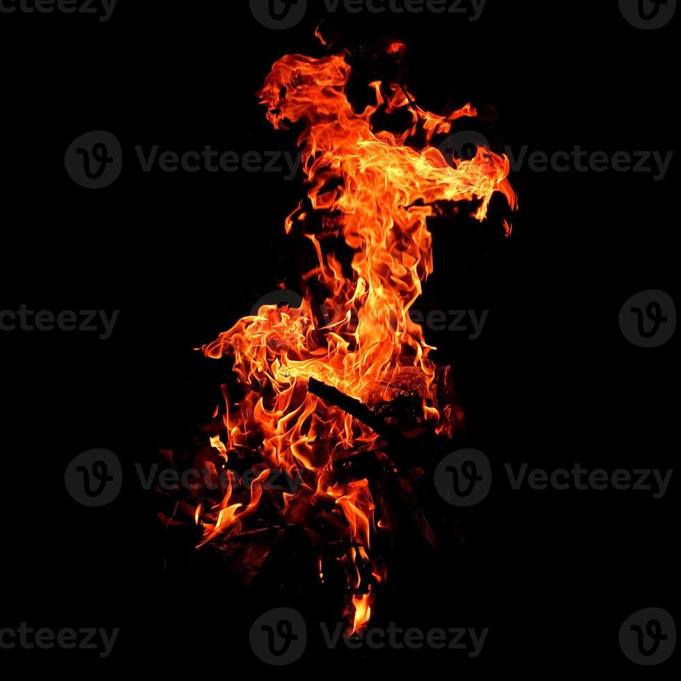 Fire of flame burning isolated on dark background for graphic design purpose photo