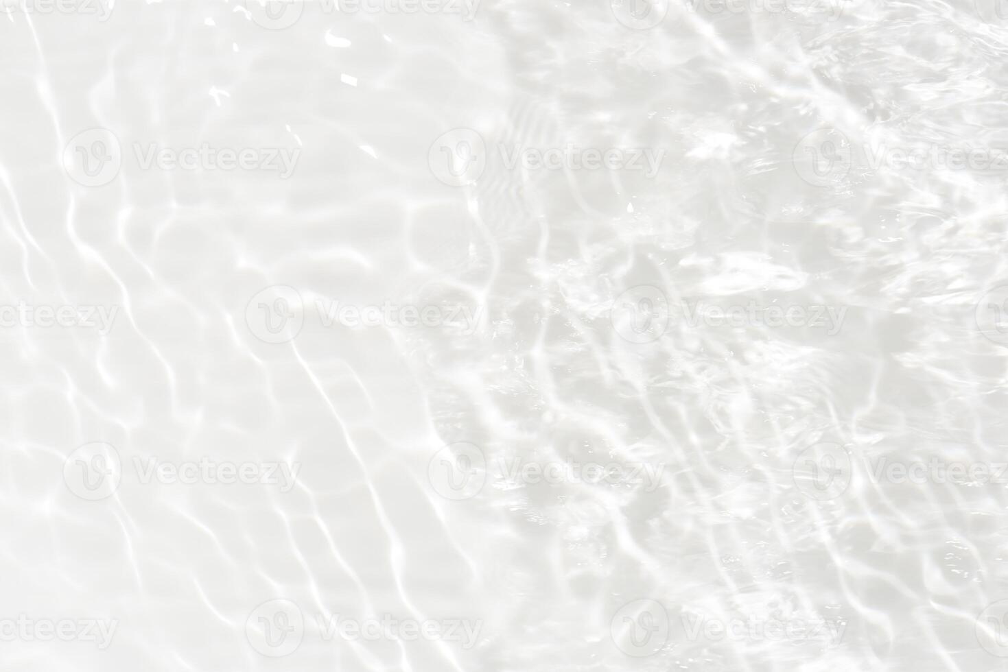 Water surface. Bluewater waves on the surface ripples blurred. Defocus blurred transparent blue colored clear calm water surface texture with splash and bubbles. Water waves with shining pattern. photo