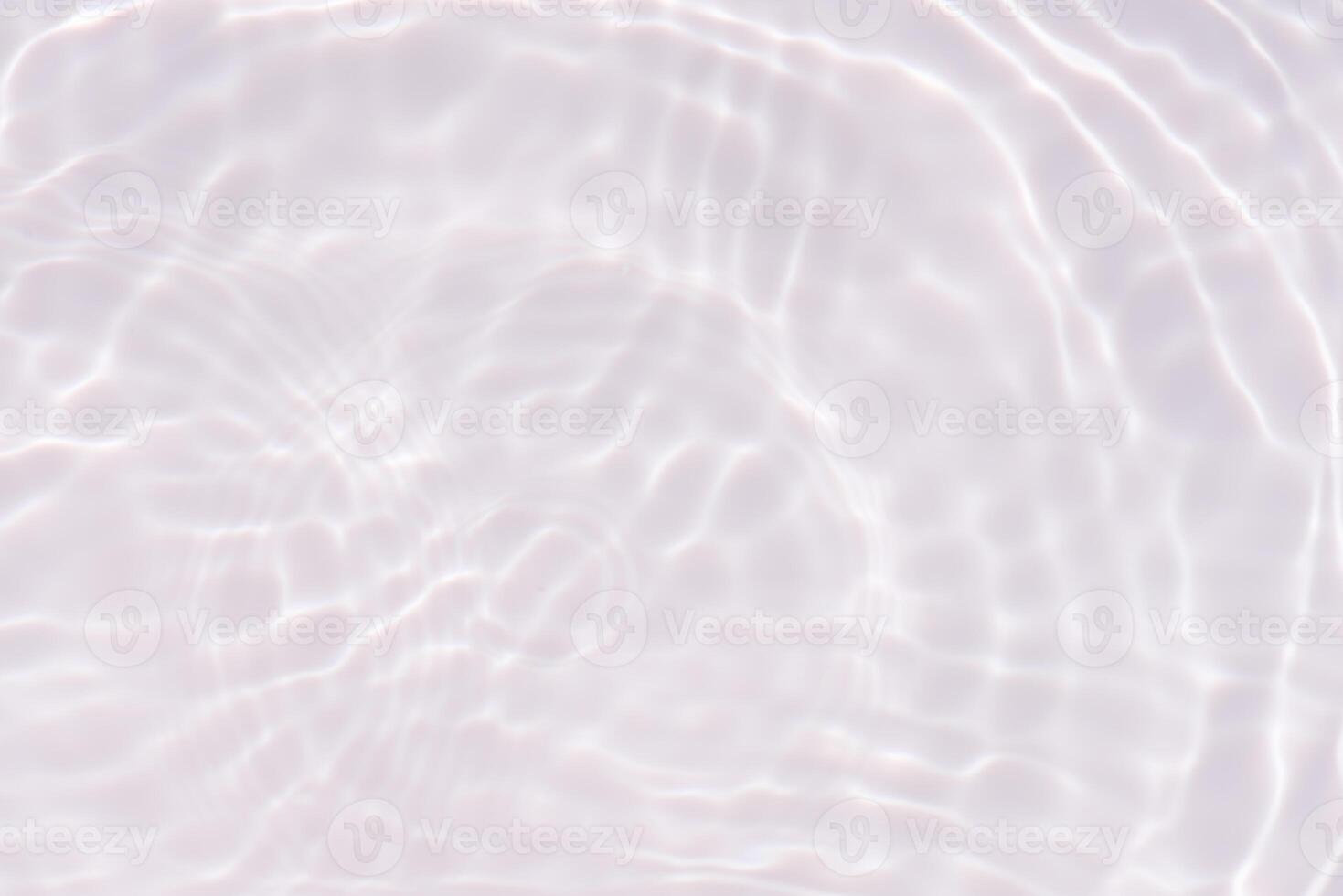 Water surface. Bluewater waves on the surface ripples blurred. Defocus blurred transparent blue colored clear calm water surface texture with splash and bubbles. Water waves with shining pattern. photo