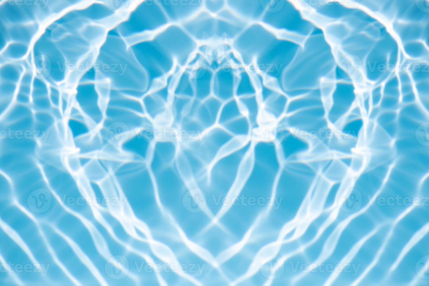 Bluewater waves on the surface ripples blurred. Defocus blurred transparent blue colored clear calm water surface texture with splash and bubbles. Water waves with shining pattern texture background. photo