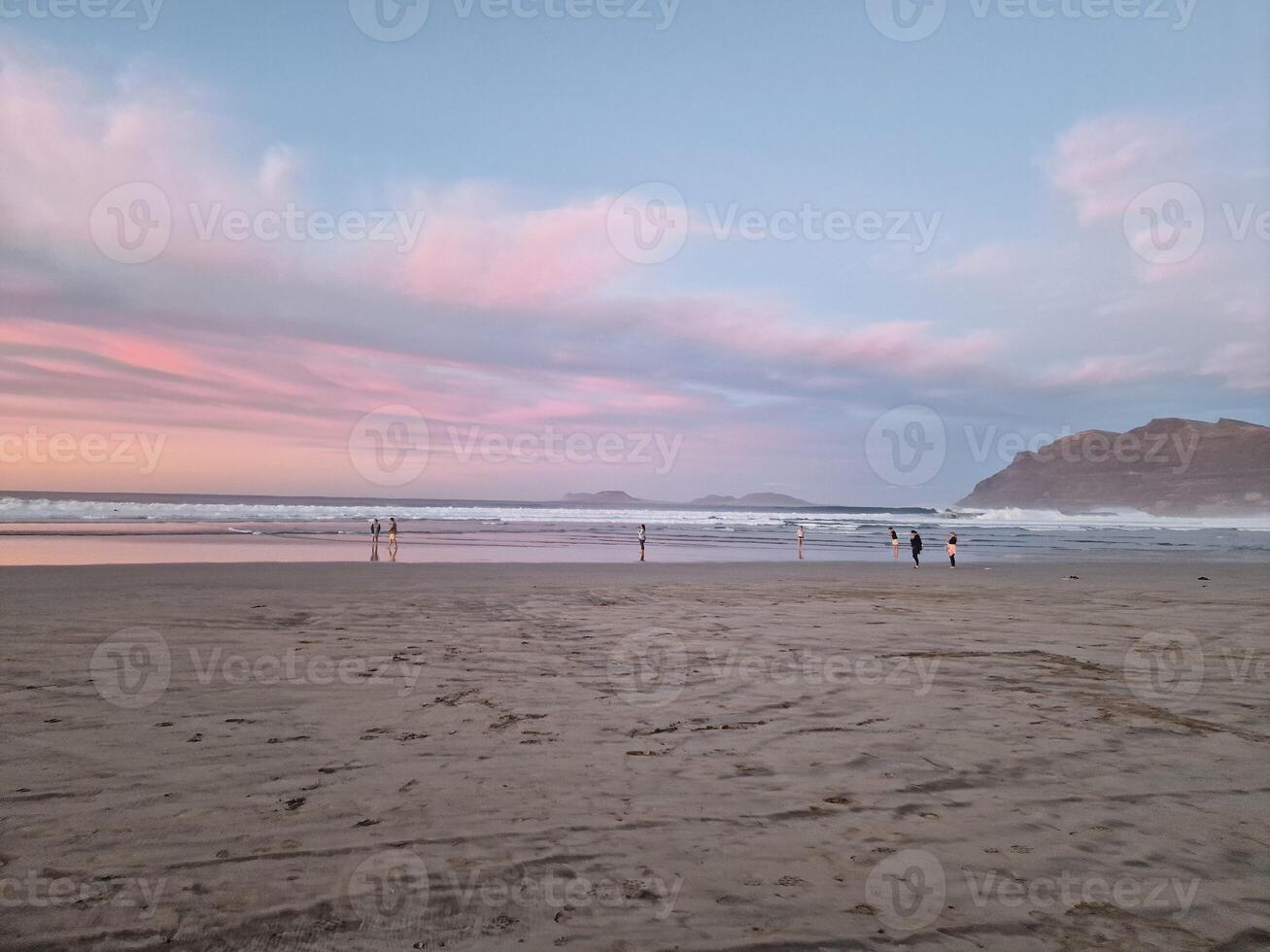 Sunset on Famara Beach on Lanzarote Island photo