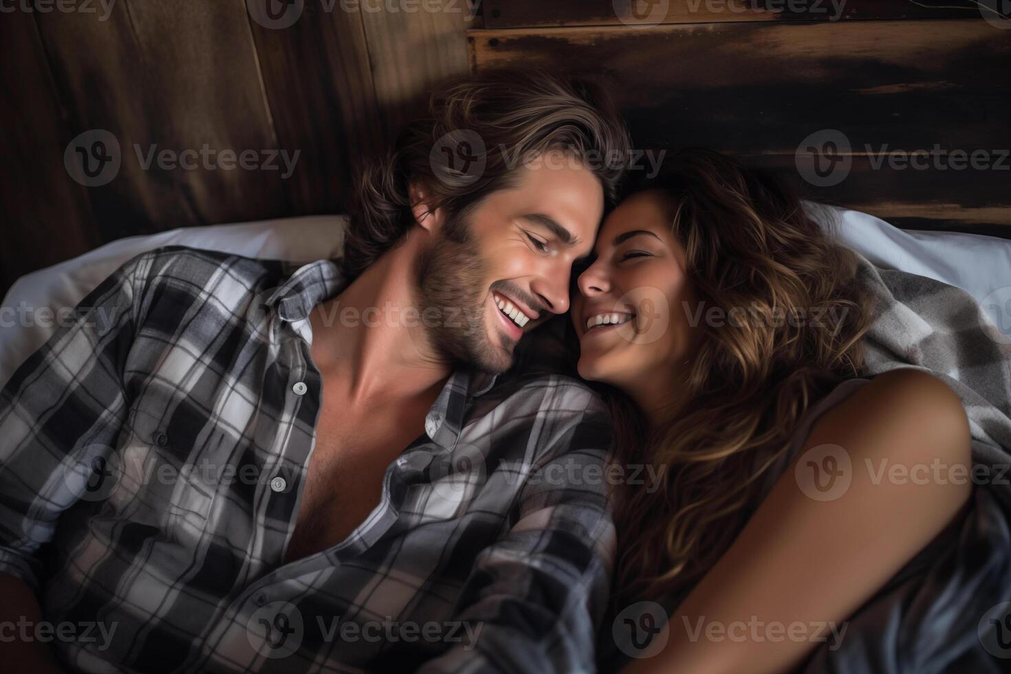 AI generated Attractive young couple laying in bed, smiling and happy. photo