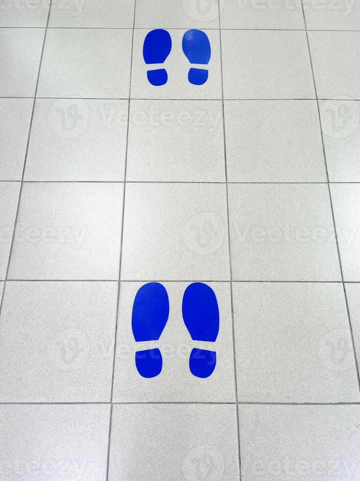 Footprint stickers for stands in shopping malls or supermarkets social distancing photo