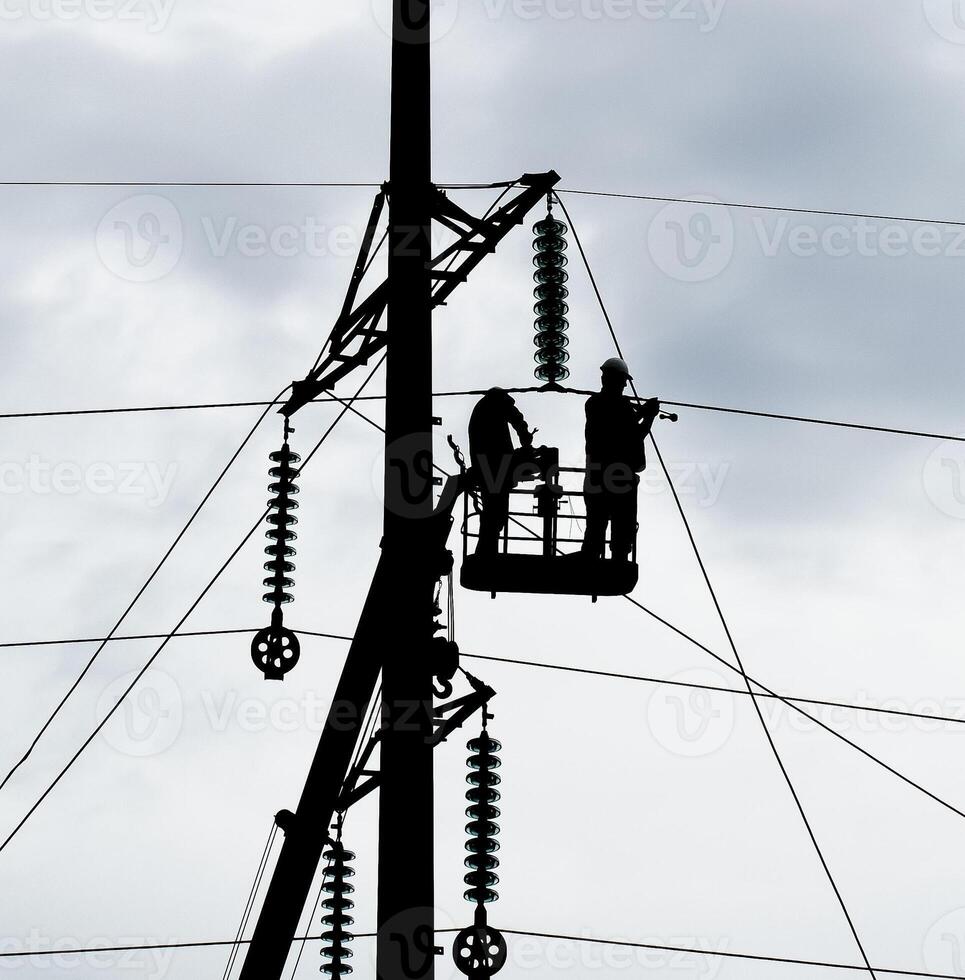 Assembly and installation of new support of a power line photo