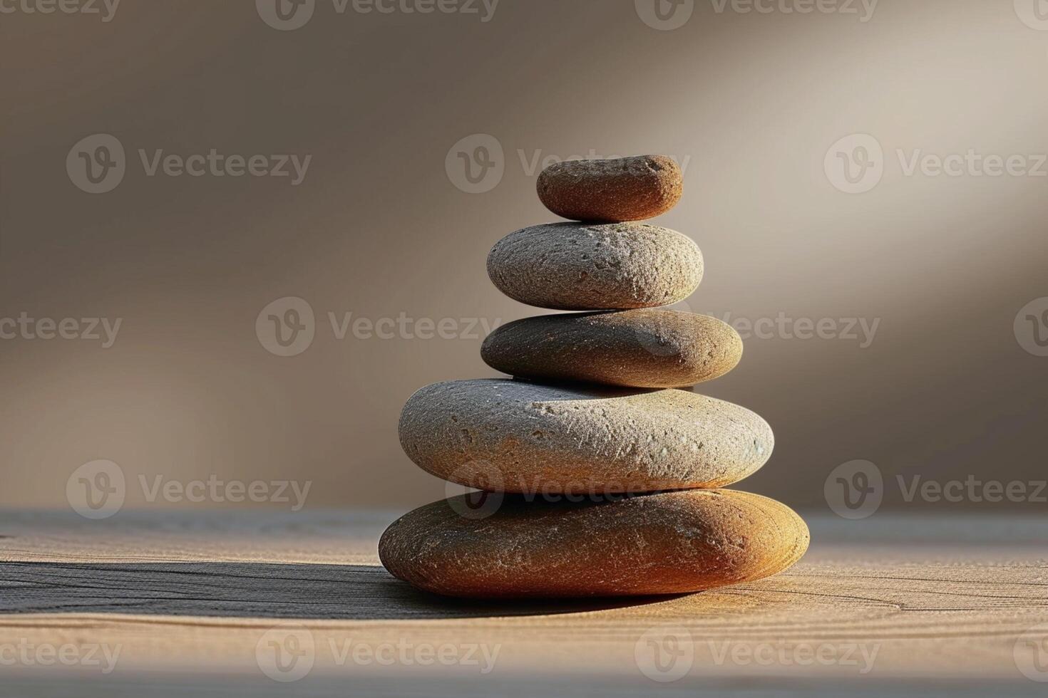 AI generated Balanced rocks form an artful stack atop a wooden table photo