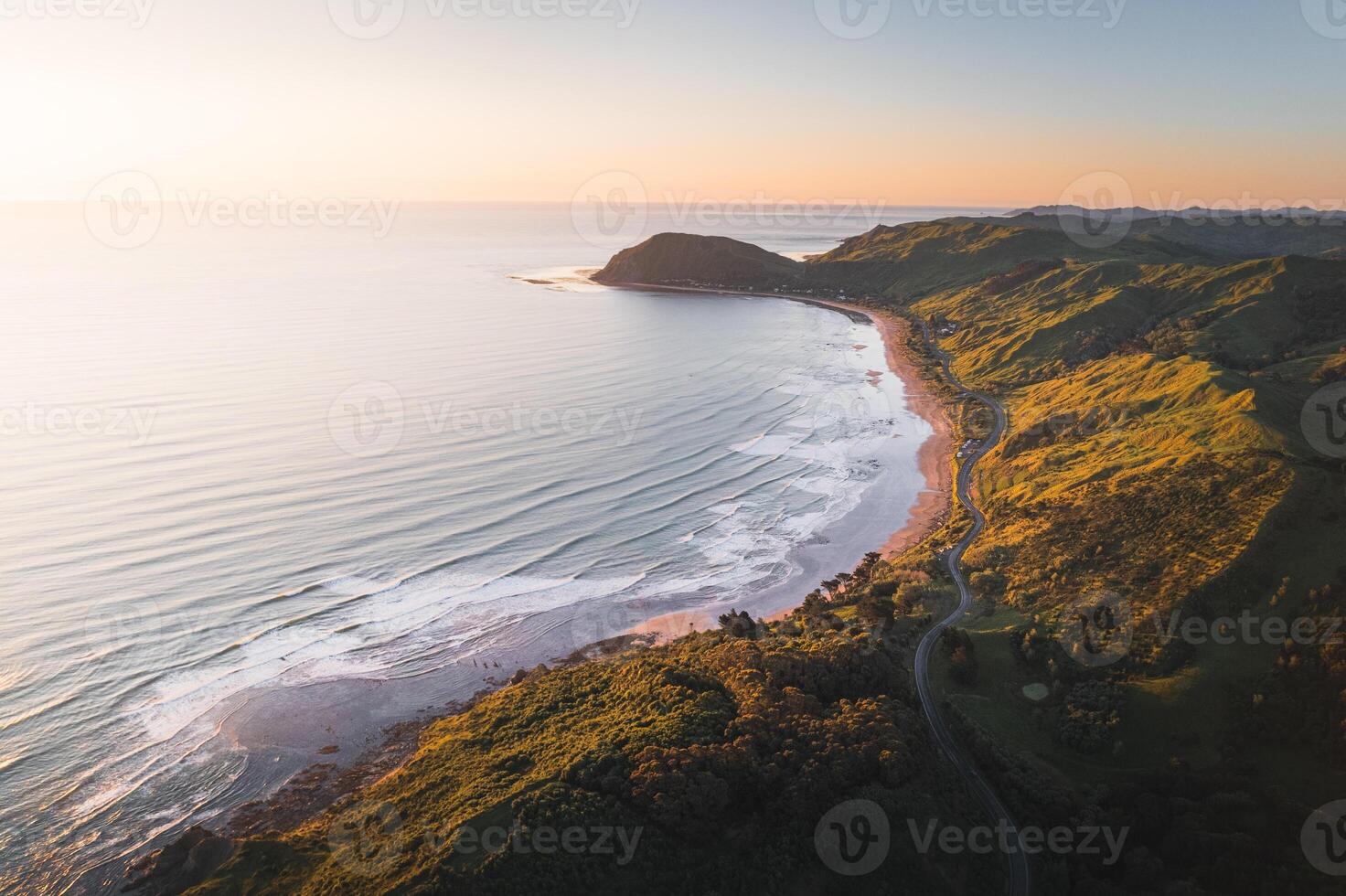 Beautiful Sunset at the Ocean Beach, New Zealand. Inspiring natural and travel background photo