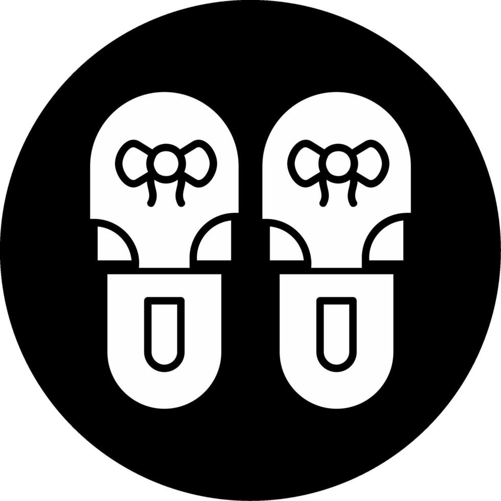 icono de vector de zapatillas