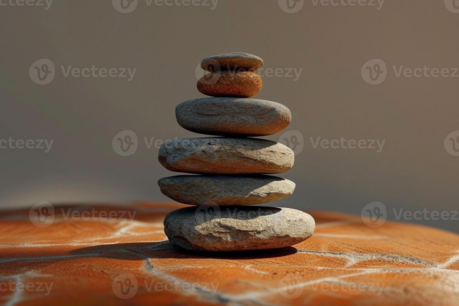 AI generated Balanced rocks form an artful stack atop a wooden table photo