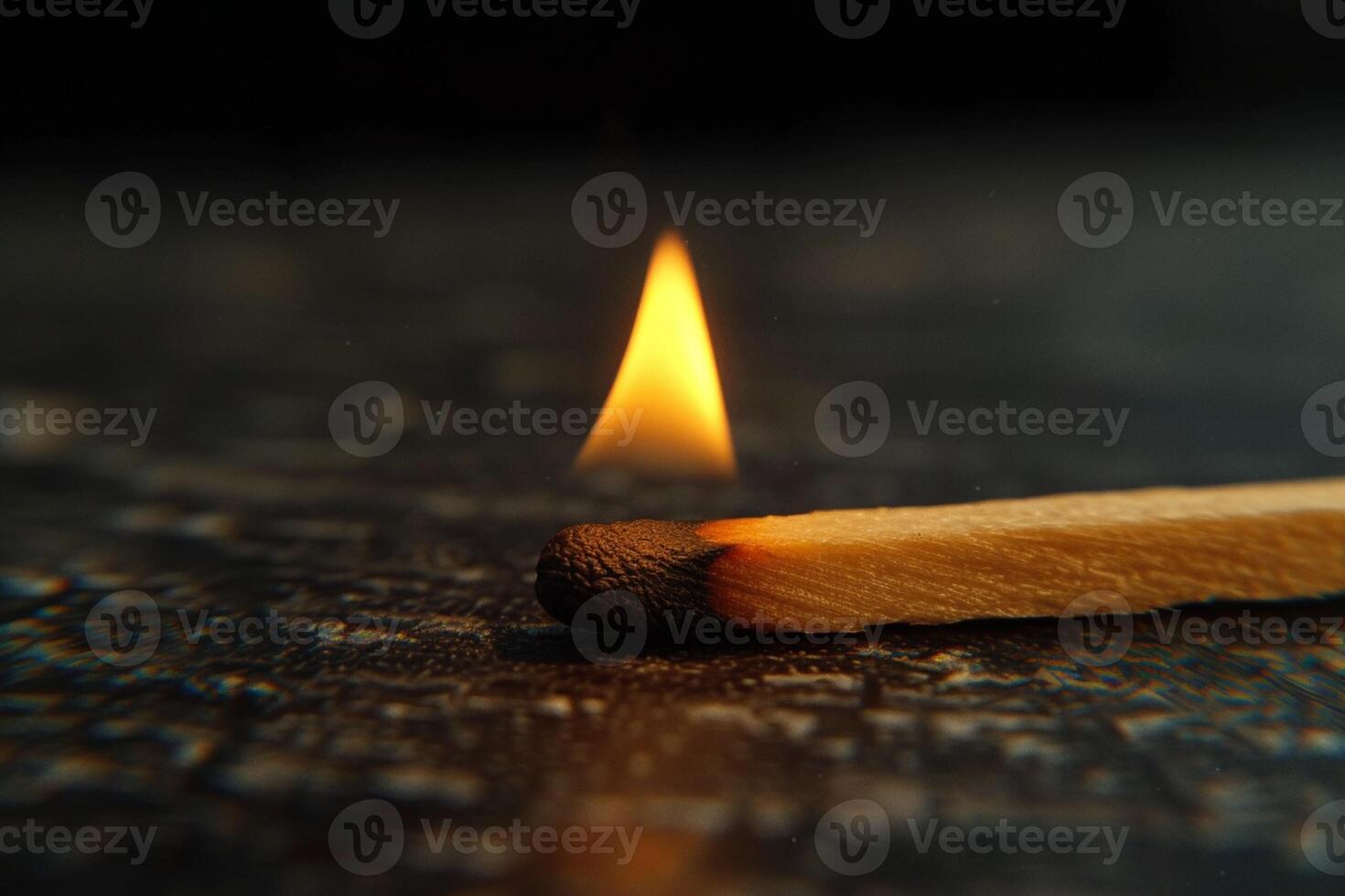 AI generated Lighted matchstick rests on a textured brown wooden surface photo