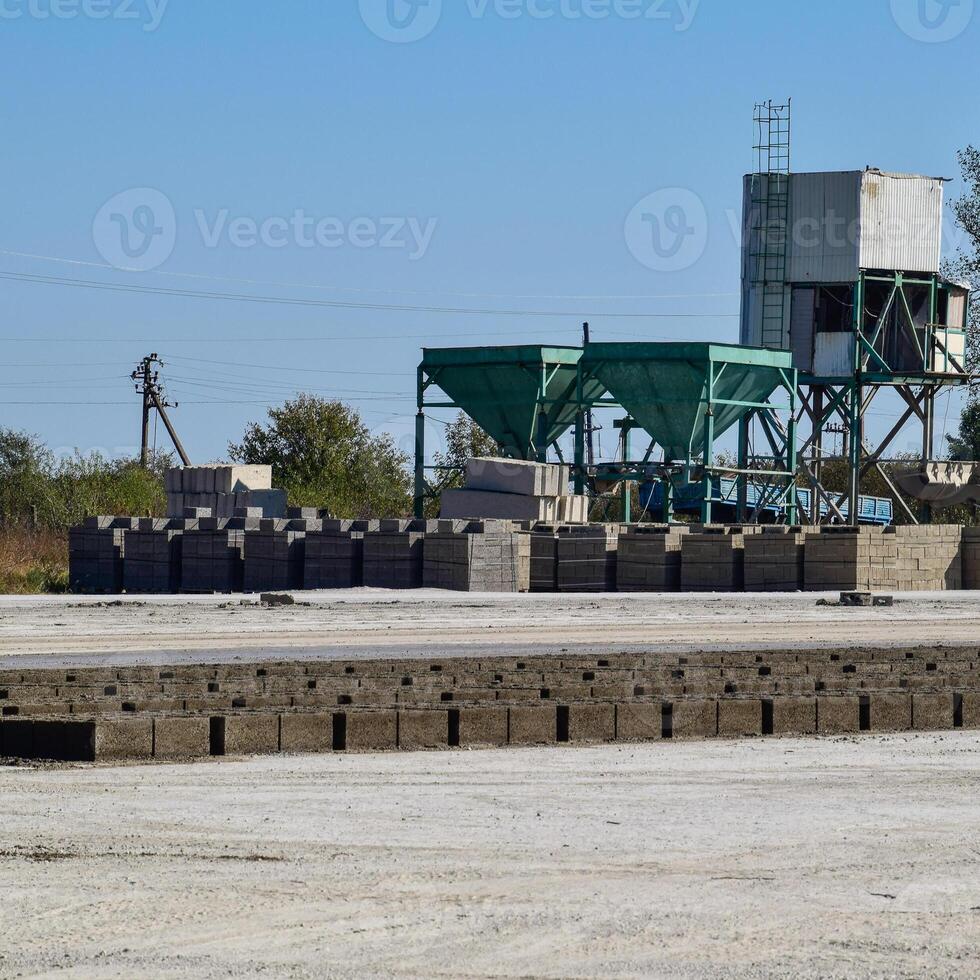 on cinder block production plant. Machinery and plant products photo