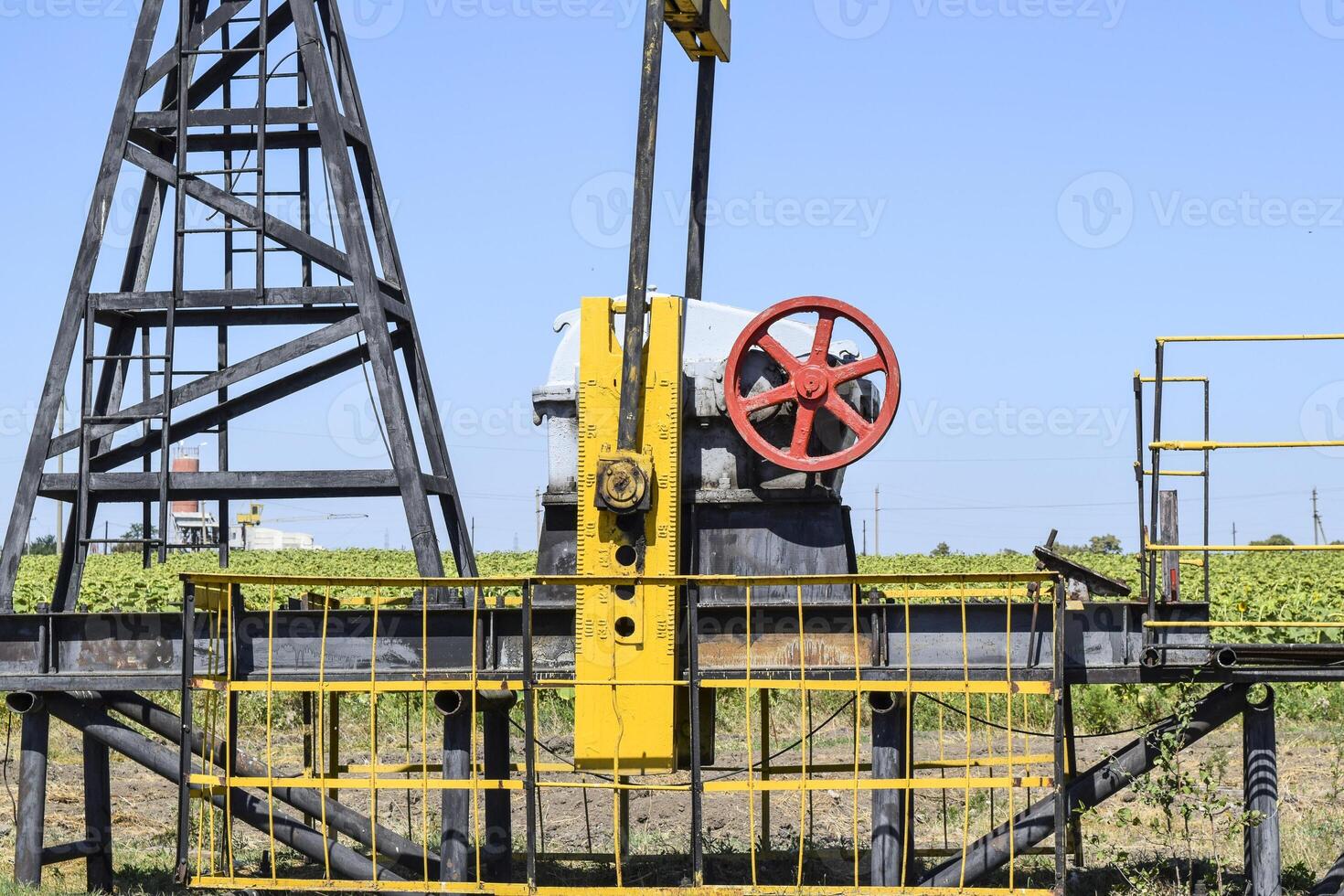 Pumping unit as the oil pump installed on a well photo