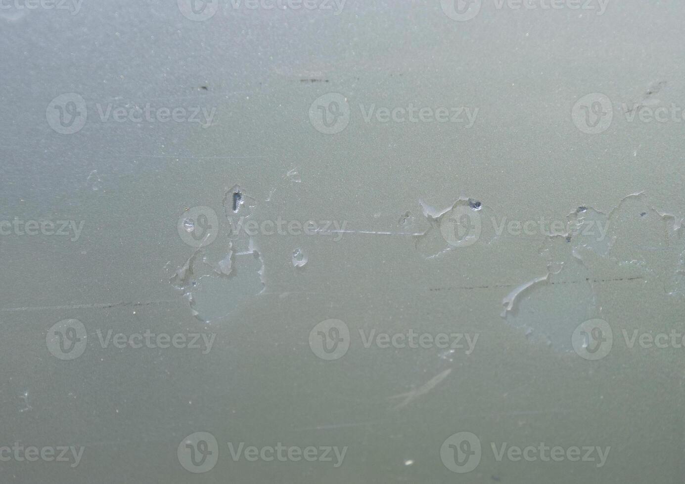 Exfoliate the old paint from the car. Rusting car. The destruction of the paint photo