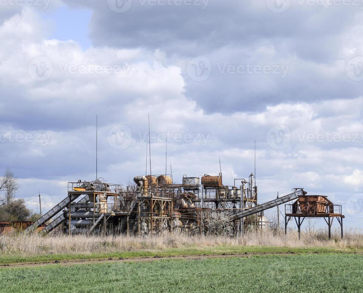 Old plant essential oil distillation. Ethereal plant. photo