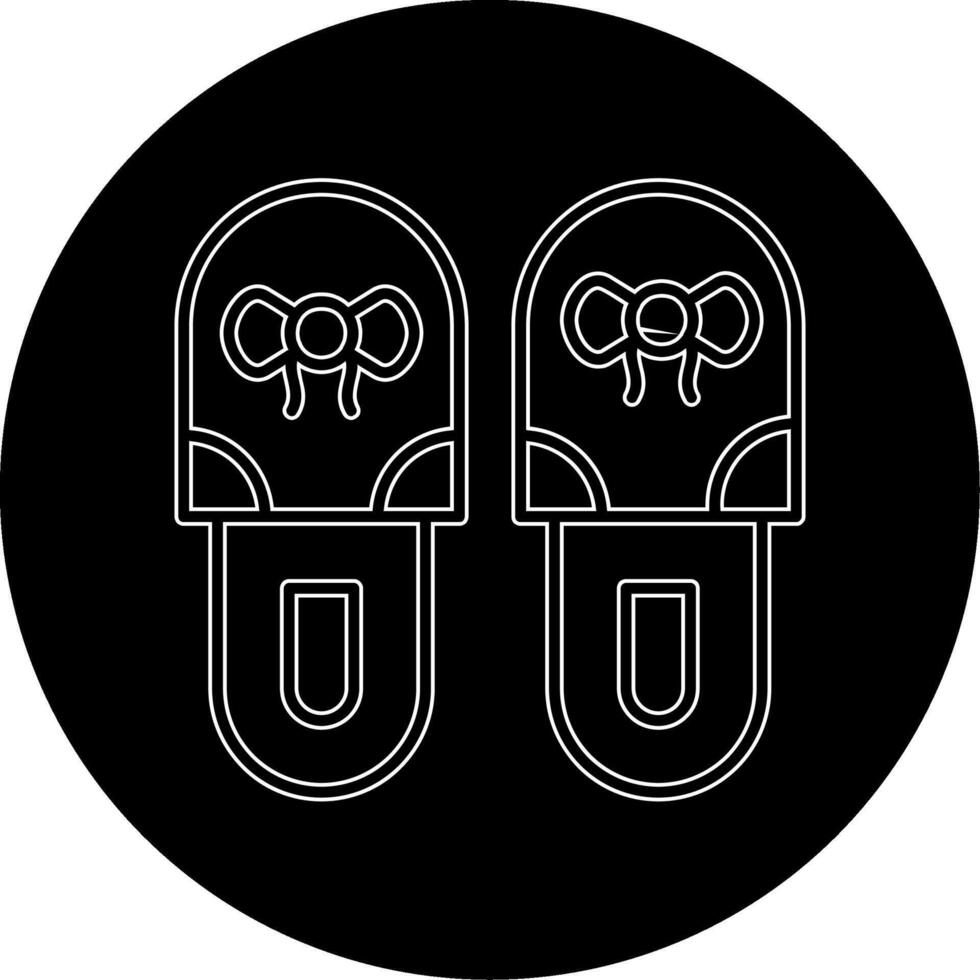 icono de vector de zapatillas