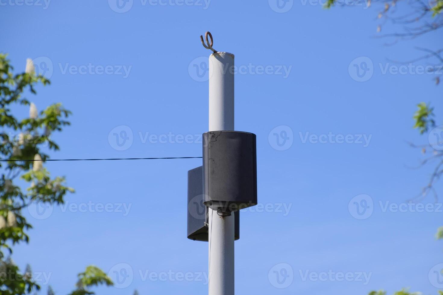 The loudspeaker on the pole. Outdoor speakers for fun walking in the park photo